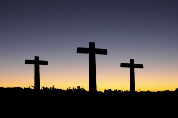 landscape-view-of-3-cross-standing-during-sunset